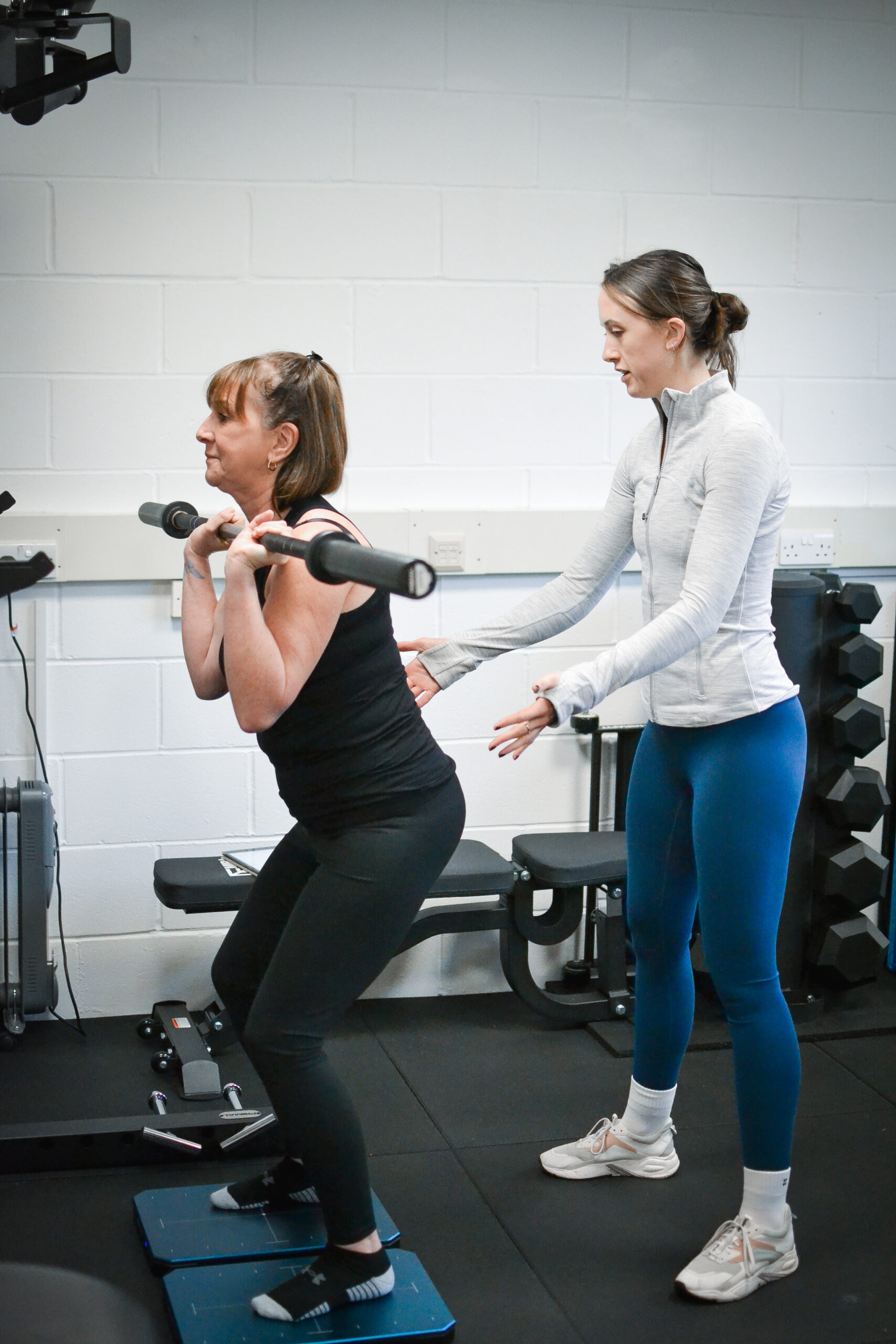 prohab-clinics-weighted-squats